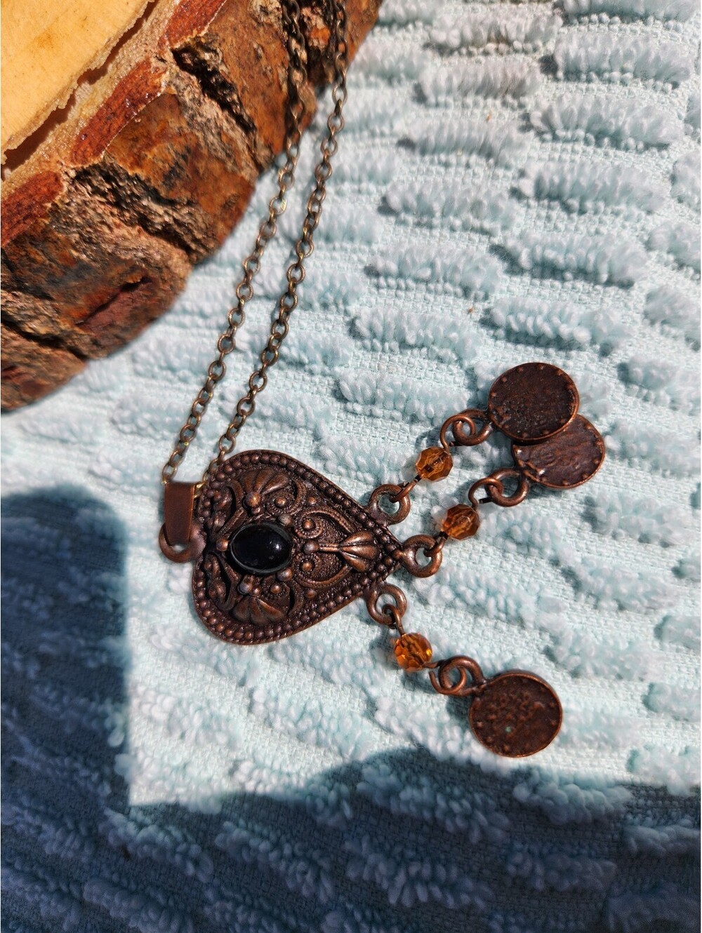 Vintage Style Copper Pendant Necklace with Black Stone and Dangling Charms